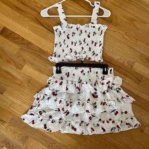 White with cherries ruffle crop stretch top with matching mini skirt. Never worn